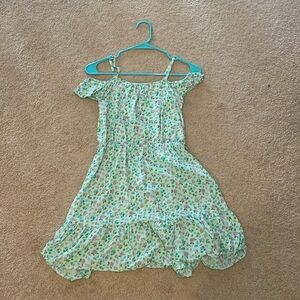 Teal floral dress. Spaghetti strap with cold shoulder. Braided belt for waist.